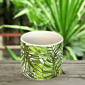 MACETERO DE CERÁMICA BLANCO CON DISEÑO DE HOJAS DE CALAS Y OTROS  11,5 D Y 10 A CMS